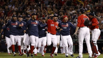 BOSTON, MASSACHUSETTS - OCTOBER 05: The Boston Red Sox run to Garrett Whitlock #72 as they celebrate their 6-2 win against the New York Yankees in the American League Wild Card game at Fenway Park on October 05, 2021 in Boston, Massachusetts.   Winslow To