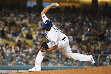 Jun 28, 2021; Los Angeles, California, USA;  Los Angeles Dodgers relief pitcher Kenley Jansen (74) pitches in the ninth inning against the San Francisco Giants at Dodger Stadium. Mandatory Credit: Richard Mackson-USA TODAY Sports